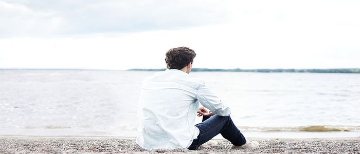 Best Travel Outfits for Men- White Shirt with Blue Jeans