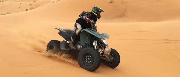 quad biking sahara desert