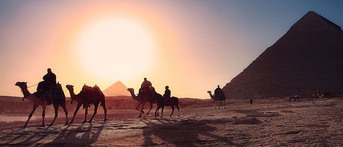 Local camel riding in the Dunes