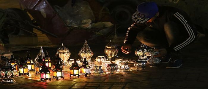 earn-money-night-market-marrakech-morocco.jpg