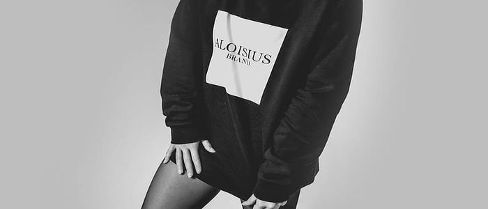 woman-in-long-sleeve-shirt-and-black-skirt.jpg
